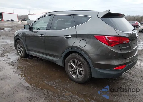 2014 Hyundai Santa Fe Sport 2.4L z USA, uszkodzony, nr VIN 5XYZUDLB1EG206574